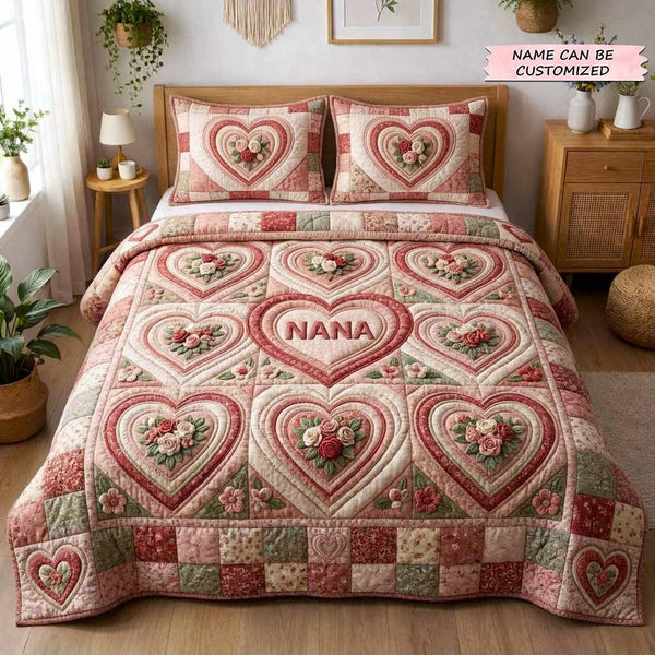 Floral Love 3-Piece Quilted Bedding Set QTCUZ - Design 2 quilted 3-piece bedding set on a made bed with two matching pillow shams