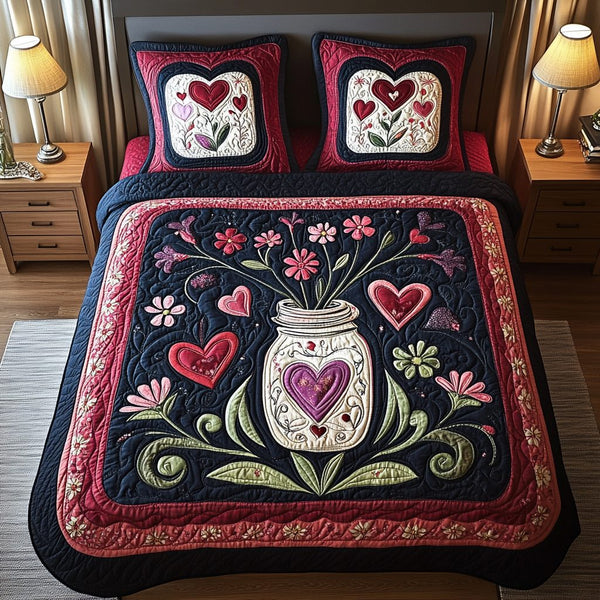 Floral Love Jar quilted 3-piece bedding set on a made bed with two matching pillow shams