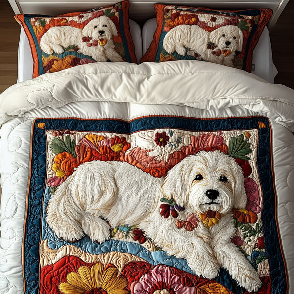 Floral Maltese quilted 3-piece bedding set on a made bed with two matching pillow shams