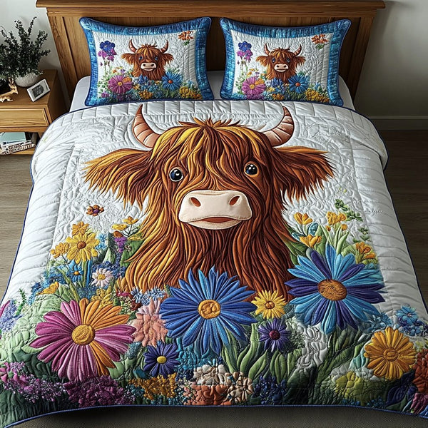 Floral Moo quilted 3-piece bedding set on a made bed with two matching pillow shams