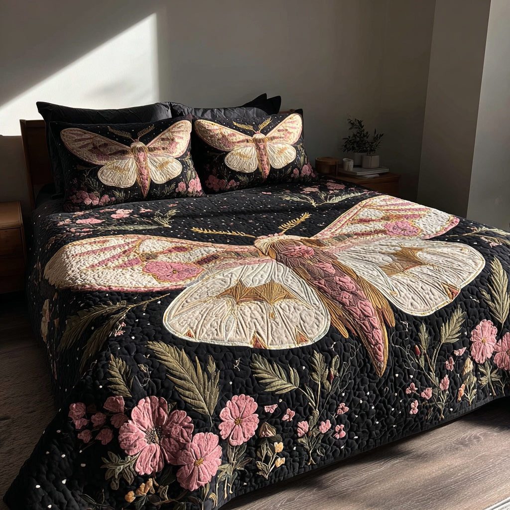 Floral Moth quilted 3-piece bedding set on a made bed with two matching pillow shams