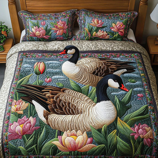 Floral Pair quilted 3-piece bedding set on a made bed with two matching pillow shams