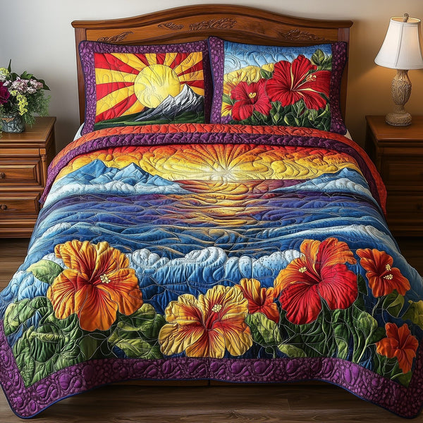 Floral Paradise quilted 3-piece bedding set on a made bed with two matching pillow shams