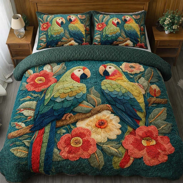 Floral Parrots quilted 3-piece bedding set on a made bed with two matching pillow shams