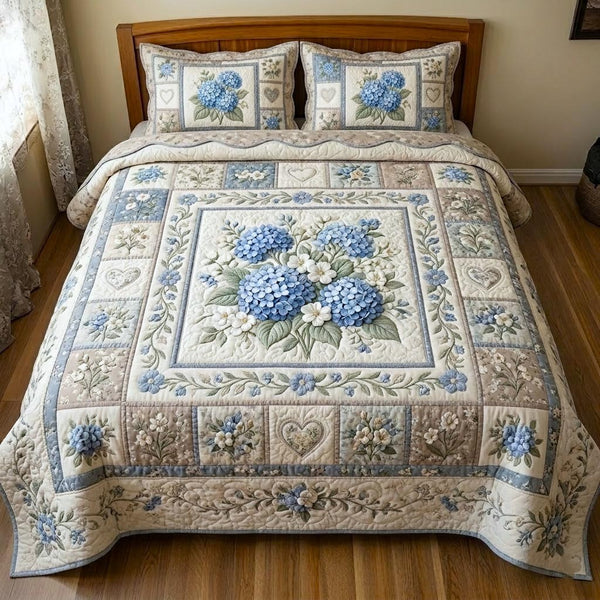 Floral Patchwork quilted 3-piece bedding set on a made bed in a farmhouse bedroom