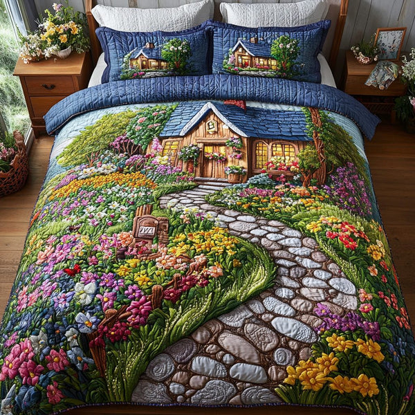 Floral Pathway quilted 3-piece bedding set on a made bed with two matching pillow shams
