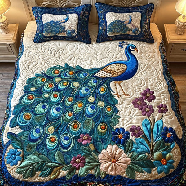 Floral Peacock Majesty quilted 3-piece bedding set on a made bed with two matching pillow shams