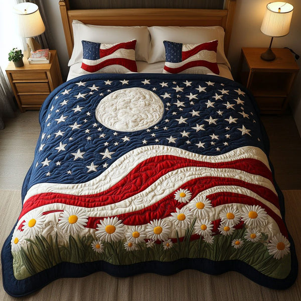 Floral Pride quilted 3-piece bedding set on a made bed with two matching pillow shams