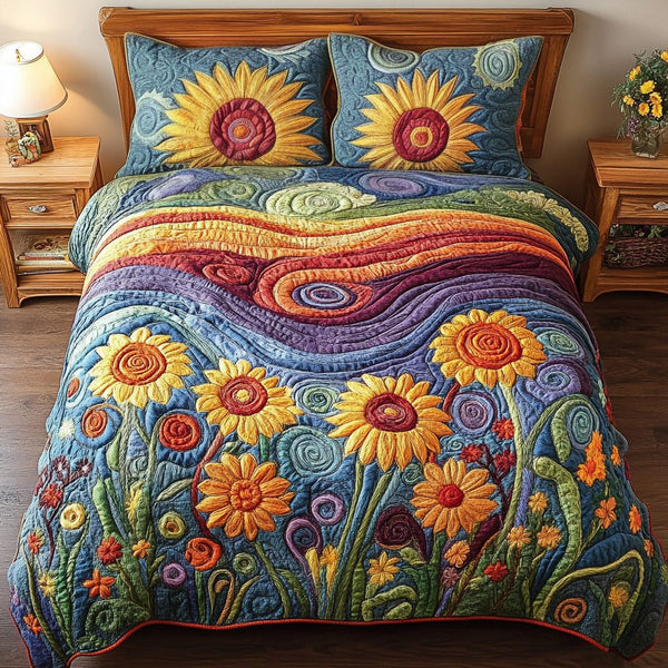 Floral Radiance quilted 3-piece bedding set on a made bed with two matching pillow shams