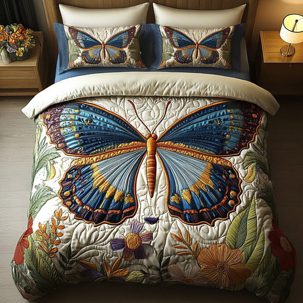 Floral Radiance quilted 3-piece bedding set on a made bed with two matching pillow shams