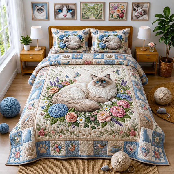 Floral Ragdoll quilted 3-piece bedding set on a made bed with two matching pillow shams