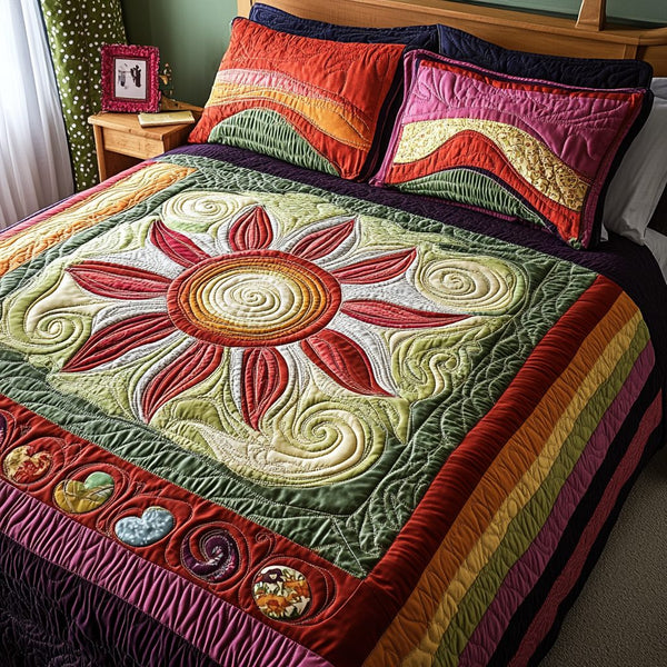 Floral Rays quilted 3-piece bedding set on a made bed with two matching pillow shams