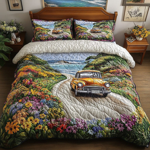 Floral Rise quilted 3-piece bedding set on a made bed with two matching pillow shams