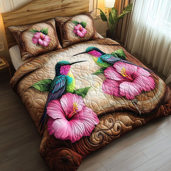 Floral Serenade quilted 3-piece bedding set on a made bed with two matching pillow shams