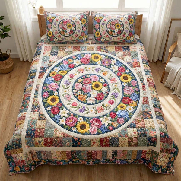 Floral Serenity quilted 3-piece bedding set on a made bed with two matching pillow shams