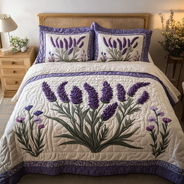 Floral Serenity quilted 3-piece bedding set on a made bed with two matching pillow shams