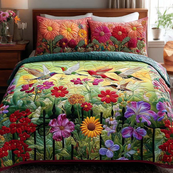 Floral Spirit quilted 3-piece bedding set on a made bed with two matching pillow shams