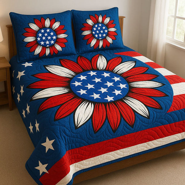 Floral Stars and Stripes quilted 3-piece bedding set on a made bed with two matching pillow shams