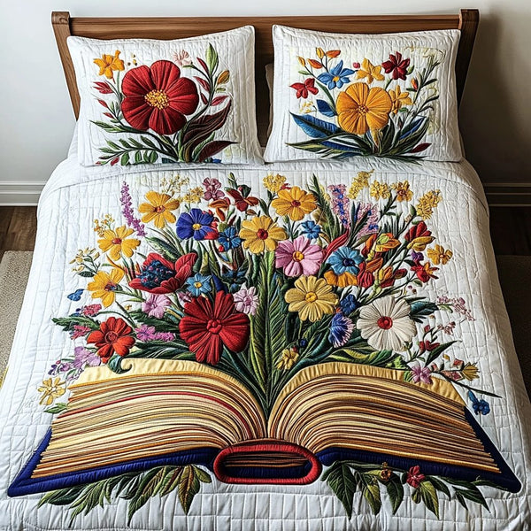 Floral Story quilted 3-piece bedding set on a made bed with two matching pillow shams