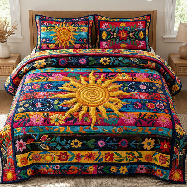 Floral Sunburst quilted 3-piece bedding set on a made bed with two matching pillow shams