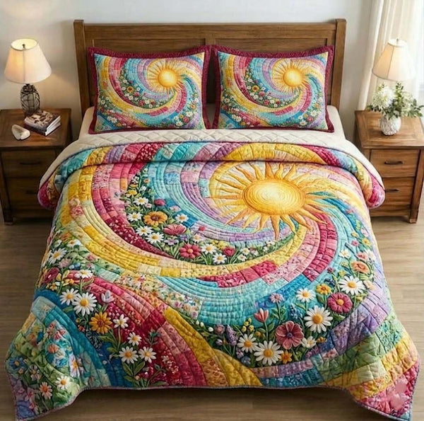 Floral Sunburst quilted 3-piece bedding set on a made bed with two matching pillow shams