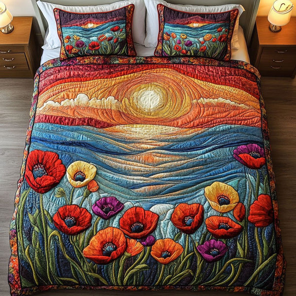 Floral Sunset quilted 3-piece bedding set on a made bed with two matching pillow shams