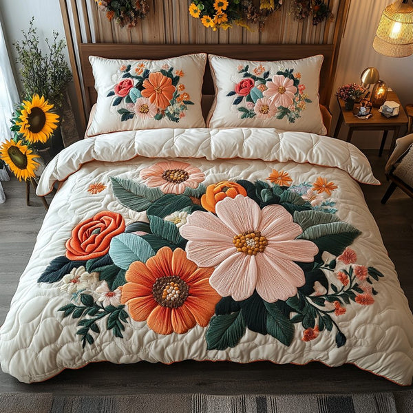 Floral Symphony quilted 3-piece bedding set on a made bed with two matching pillow shams