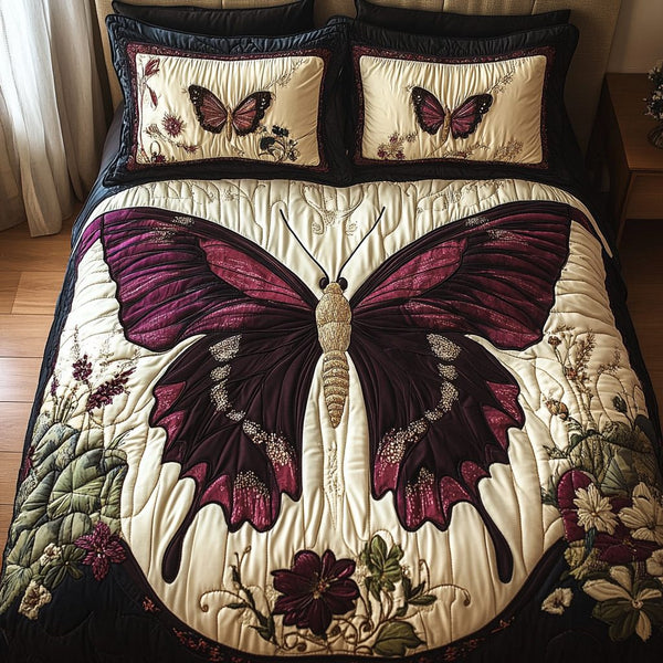 Floral Wings quilted 3-piece bedding set on a made bed with two matching pillow shams