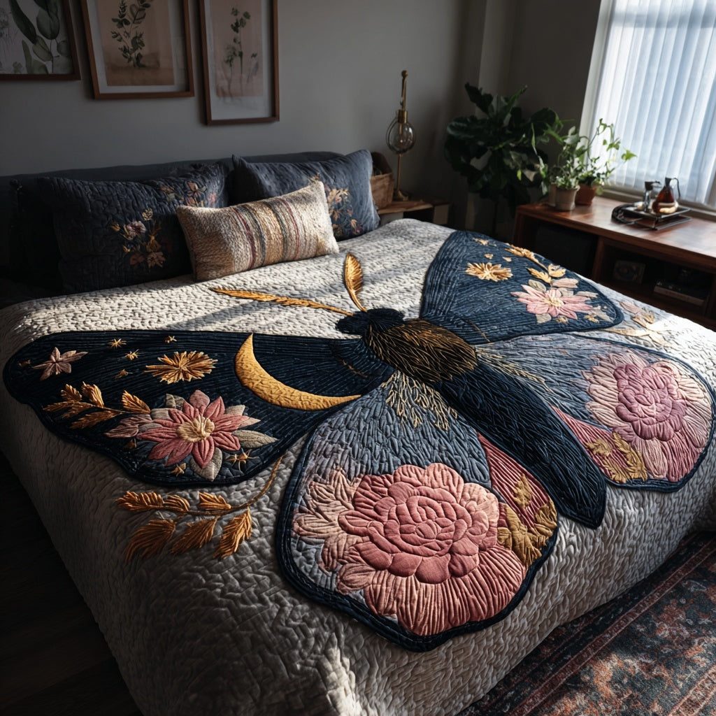 Floral Wings quilted 3-piece bedding set on a made bed with two matching pillow shams