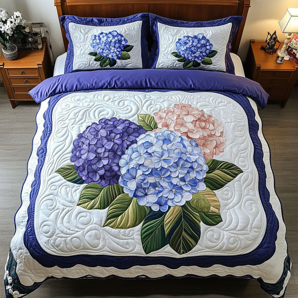 Flourish of Colors quilted 3-piece bedding set on a made bed with two matching pillow shams