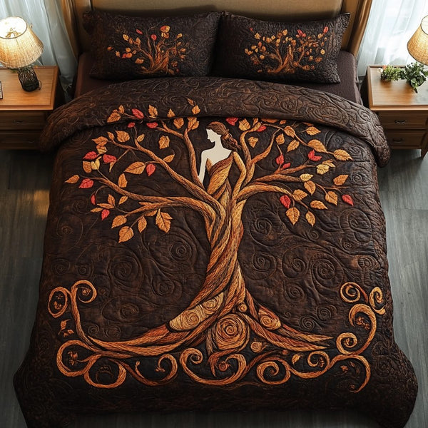 Flourishing Spirit quilted 3-piece bedding set on a made bed with two matching pillow shams
