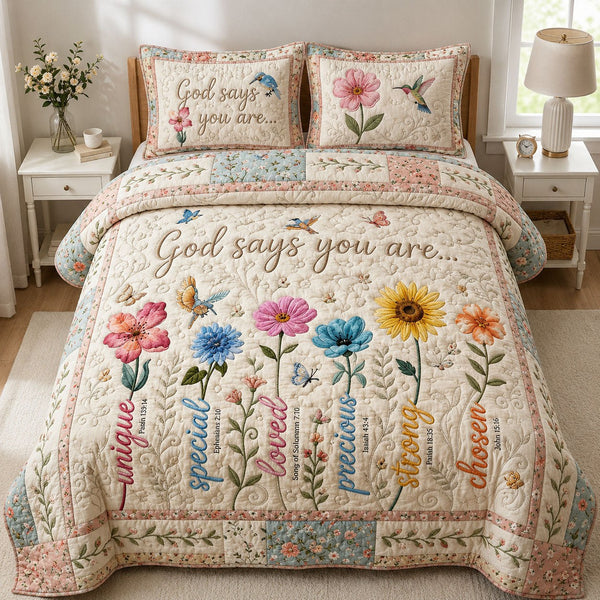 Flower Bible Verses quilted 3-piece bedding set on a made bed in a softly lit bedroom