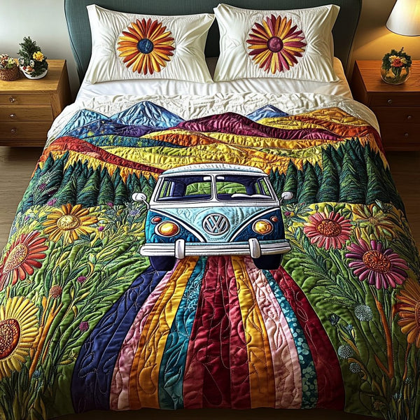 Flower Drive quilted 3-piece bedding set on a made bed with two matching pillow shams