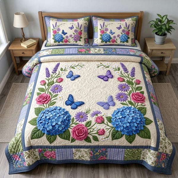 Flower Garden quilted 3-piece bedding set on a made bed with two matching pillow shams