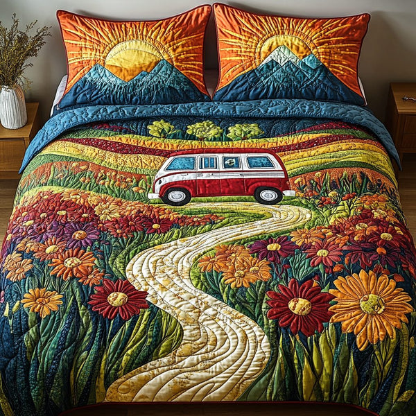 Flower Power Ride quilted 3-piece bedding set on a made bed with two matching pillow shams
