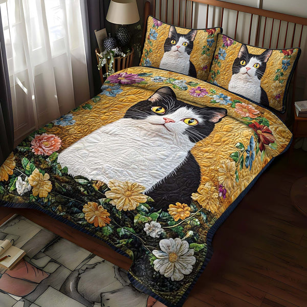 Flowered Feline quilted 3-piece bedding set on a made bed with two matching pillow shams