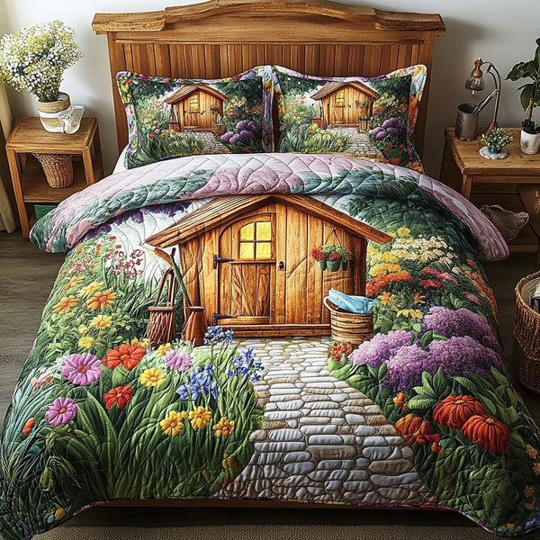 Flowery Retreat quilted 3-piece bedding set on a made bed with two matching pillow shams