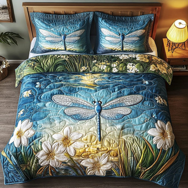 Flowing Wings quilted 3-piece bedding set on a made bed with two matching pillow shams