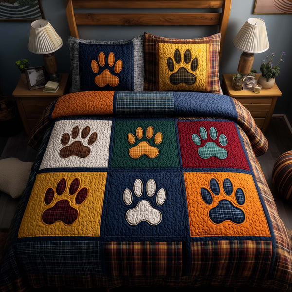 Fluffy Paws quilted 3-piece bedding set on a made bed with two matching pillow shams