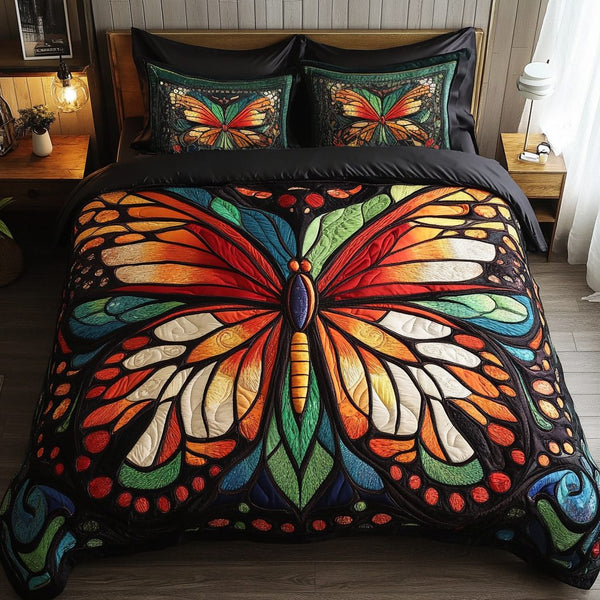 Flutter Bloom quilted 3-piece bedding set on a made bed with two matching pillow shams