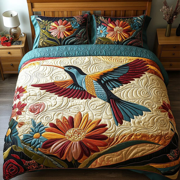 Flutter Breeze quilted 3-piece bedding set on a made bed with two matching pillow shams
