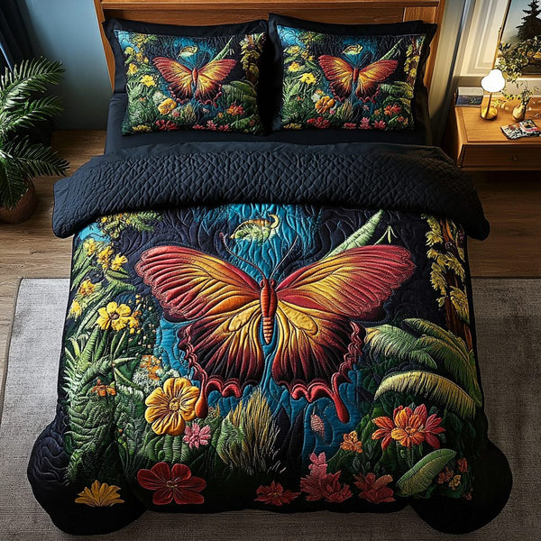 Flutter Dreams quilted 3-piece bedding set on a made bed with two matching pillow shams