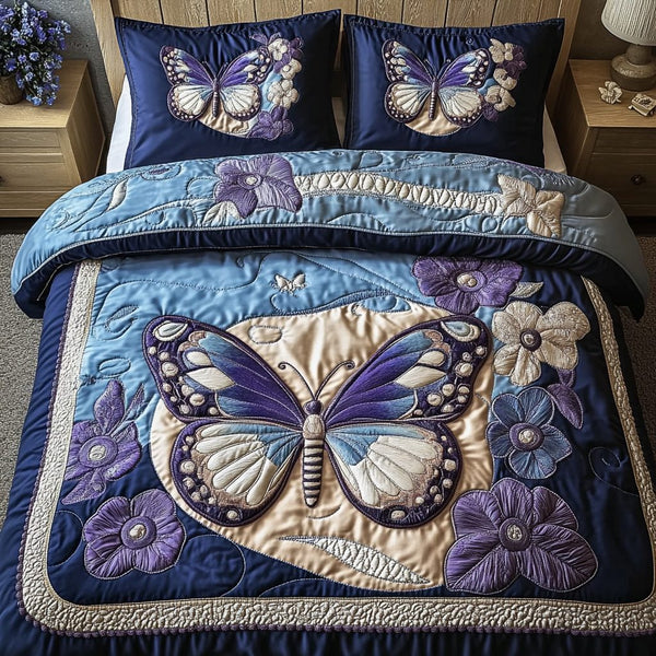 Flutter Grace quilted 3-piece bedding set on a made bed with two matching pillow shams