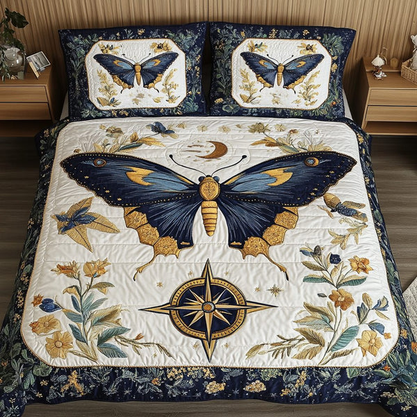 Flutter Night quilted 3-piece bedding set on a made bed with two matching pillow shams