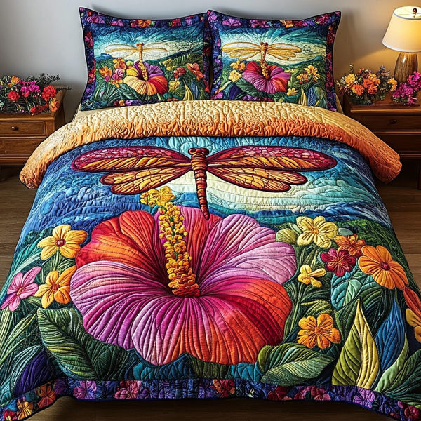 Fluttering Beauty quilted 3-piece bedding set on a made bed with two matching pillow shams