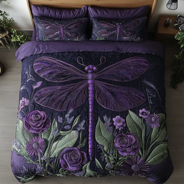 Fly Away quilted 3-piece bedding set on a made bed with two matching pillow shams