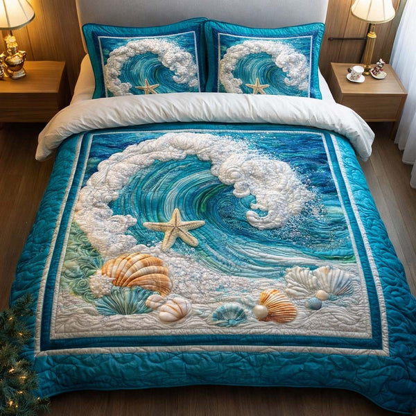 Foamy Wave quilted 3-piece bedding set on a made bed in a light coastal bedroom