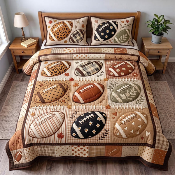 Football Season quilted 3-piece bedding set on a made bed with two matching pillow shams