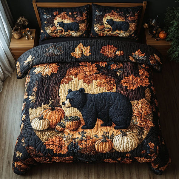 Forest Bear Wanderer quilted 3-piece bedding set on a made bed with two matching pillow shams