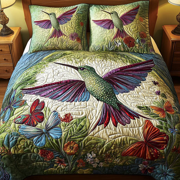 Forest Bloom quilted 3-piece bedding set on a made bed with two matching pillow shams